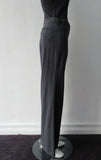 Charcoal grey wool trousers with side welt pockets. Size 8. 100% Wool Dry Clean Only. Inseam 80cm, Outseam 105cm