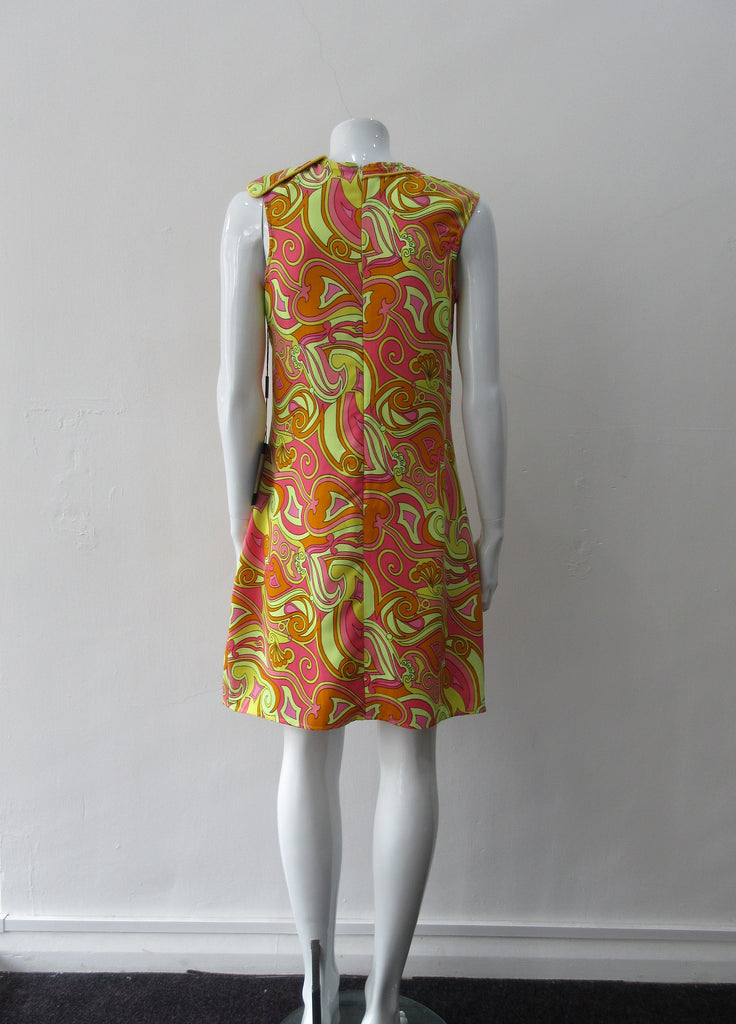 Bright Yellow Print Dress. Below the knee dress with 60's style yellow, pink and orange design. Chinese style piping trim accent in yellow satin piping. CB zipper. Fully lined.