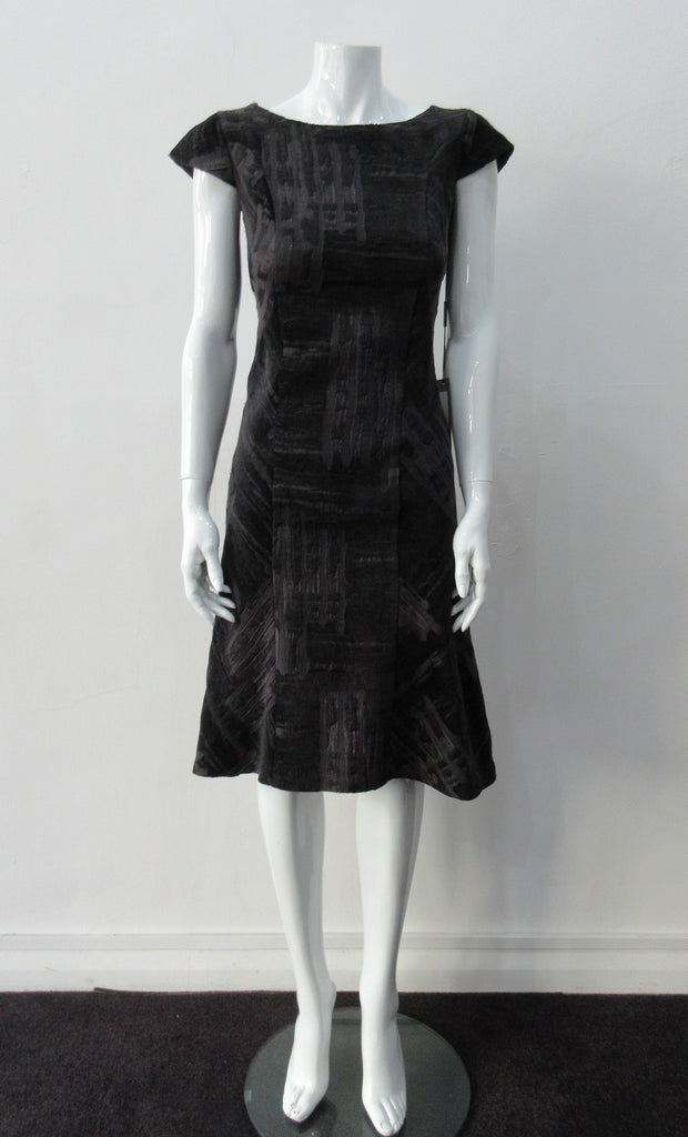 Sided Dress. A classic look with front piece with cross-cut side panels. Charcoal grey and black satin & velvet combination with cap sleeves. CB zipper fully lined
