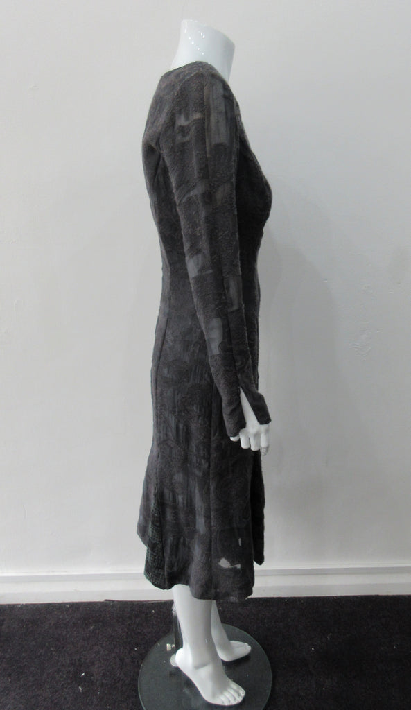 Godet Hem Dress. Rich charcoal grey below the knee dress with lower and wider cut neckline, Dress length from CB 106cm 450g approximate weight, Size 8, 27% Nylon, 25% Wool, 20% Cotton, 15% Viscose Contrast: 77% Viscose, 13% Nylon, 10% Cotton, Lining 100% Rayon