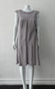 Pleated Cross Seam Dress. Blue-Grey dress with cross seam panel details. Falls below the knee. 65% Linen, 35% Cotton. Contrast: 58% Nylon, 42% Polyester Lining: 100% Rayon Dry Clean Only. 250g approximate weight. Made in Croatia