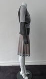 Double Fold Dress. Roman style pleat fold dress in very comfortable soft jersey. Soft grey with Chocolate Brown contrast panels. Long sleeved, side invisible zipper. CB Length 96.5cm, Sleeve Length 73cm. 400g approximtate weight. 100% Modal, Dry Clean Only, Made in England