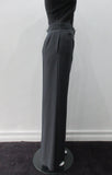110112 Tailored Touser. Deep Grey Wool Crepe flowing with flared hem, Reverse pocket details on front. Size 8, Inseam 85cm, Outseam 106cm, 100% Wool, Contrast: 100% Cotton, Lining: 100% Rayon, Made in England