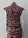 Sleeveless Jacket, Mid-Crop red & grey weave with extended cap at shoulder point for faux sleeve top. Matches with 110701 Yoke Skirt. CB Length 49cm. 450g approximate weight. Size 8. 45% Cotton, 35% Nylon, 15% Polyester, 5% Viscose Lining: 100% Rayon Dry Clean Only. Made in Canada