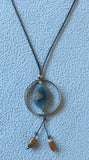 Blue Stone Necklace black cord beads close-up image photo picture