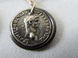 Karyn Chopik Roman Coin in Ring Earring. Item Number E1158. Sterlng Silver & Copper. 25g approximate weight, Made in Canada