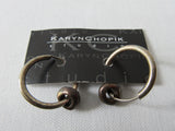 Karyn Chopik Double Ring Earring. Item Number: E124. Large ring combined with small ring. Sterling Silver, Antiquated Brass & Copper, 20g approximate weight