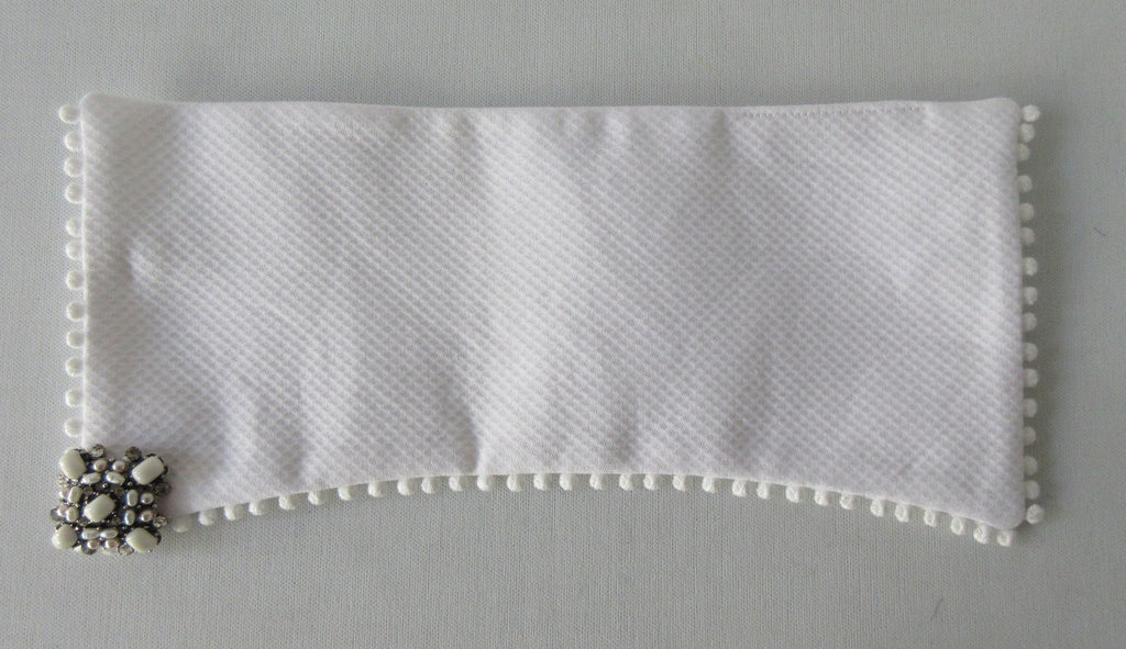 Catherine Osti White Cotton Pique Cuffs. 100% Cotton. Small pleats approximately 3-4mm width. Snap Closure. 19.5cm width snap to snap. 60g approximate weight, comes in white box. Made in France  £155.00