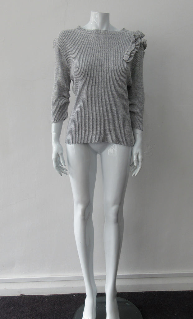 Grey rib knit cardigan with open shoulder applique design on left side. CB Length 60cm, Sleeve Length 54cm, 100% Cotton, Hand wash cold seperately, Dry flat to re-shape. 450g approximate weight, Made in China
