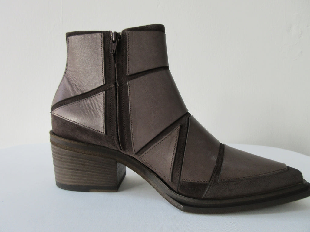 Vic Matie Brown Paneled Boot. Product Number: Vic Mate 1M6024D.M80 Combo 78 Tronch.HKS/Madden 125/351. Stitched panel leather panels in geometric design. Deep solid taupe colour. 100% Leather. Made in Italy